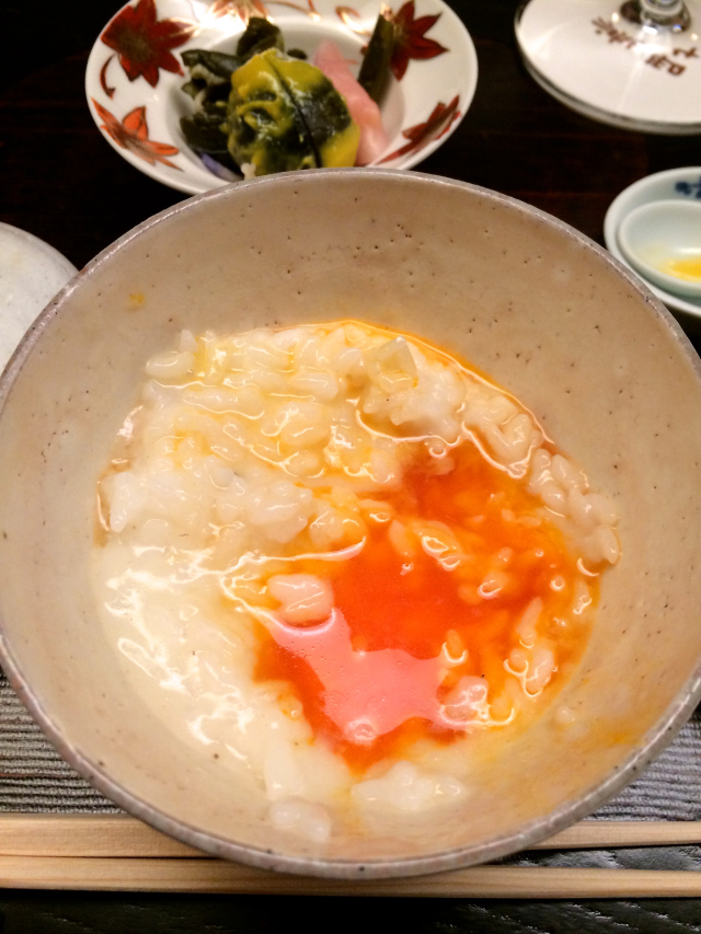 Truffle scented rice porridge with poached eggs 